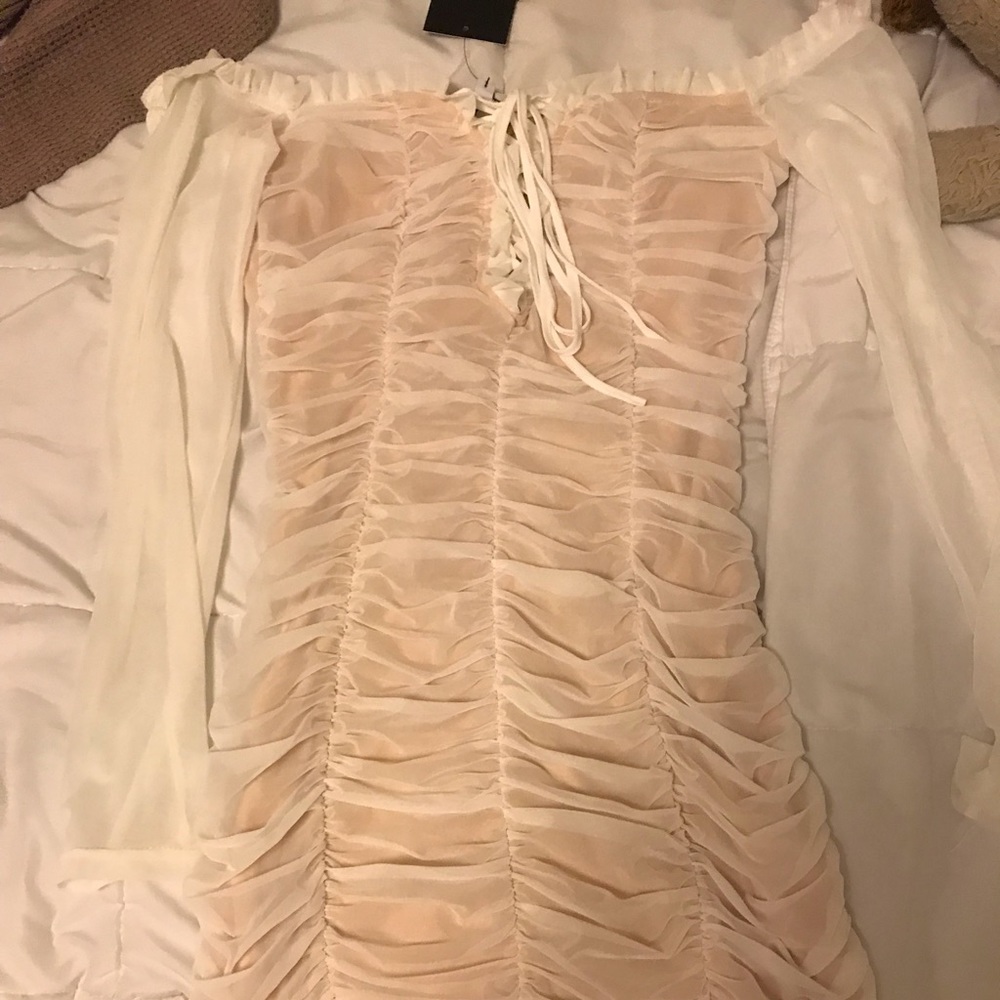 Tight fitting white dress